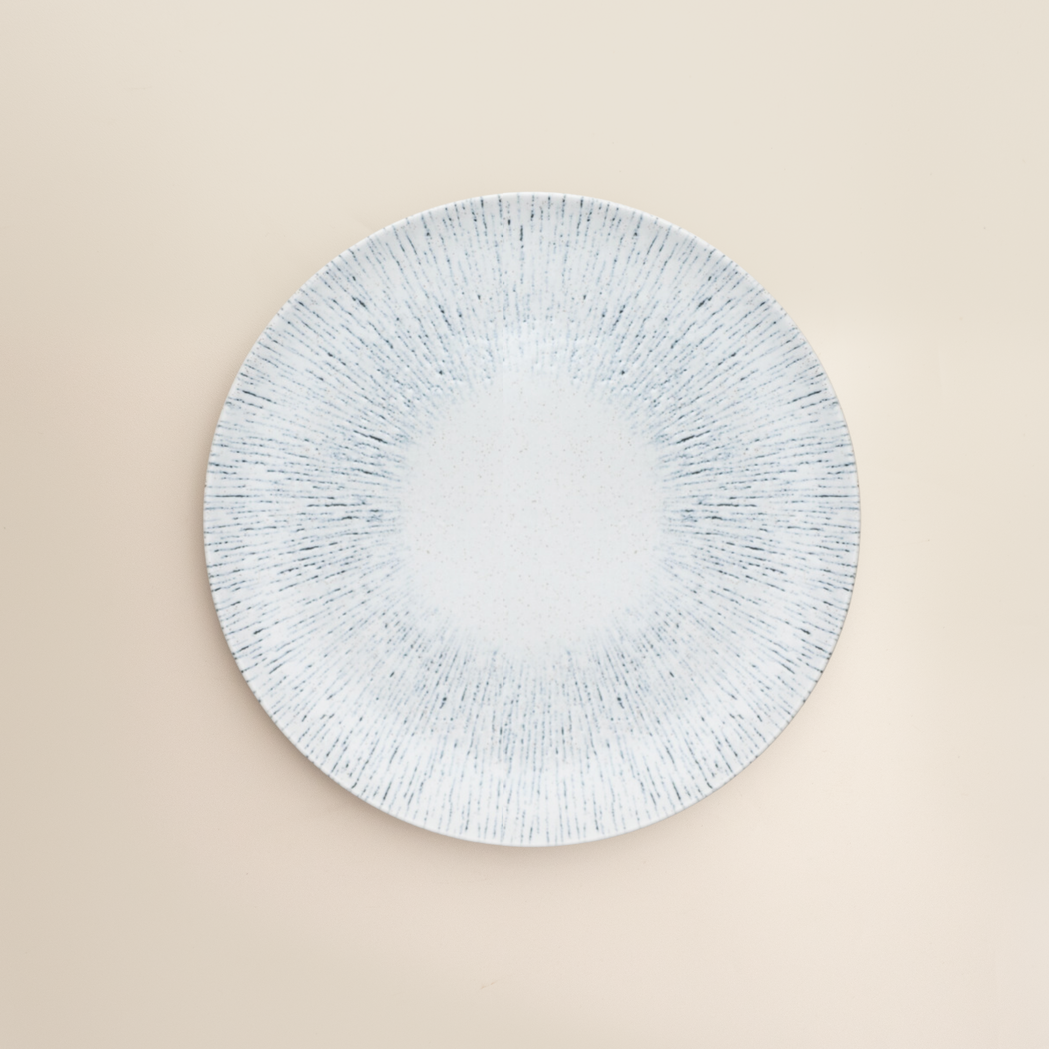 white line print round plate